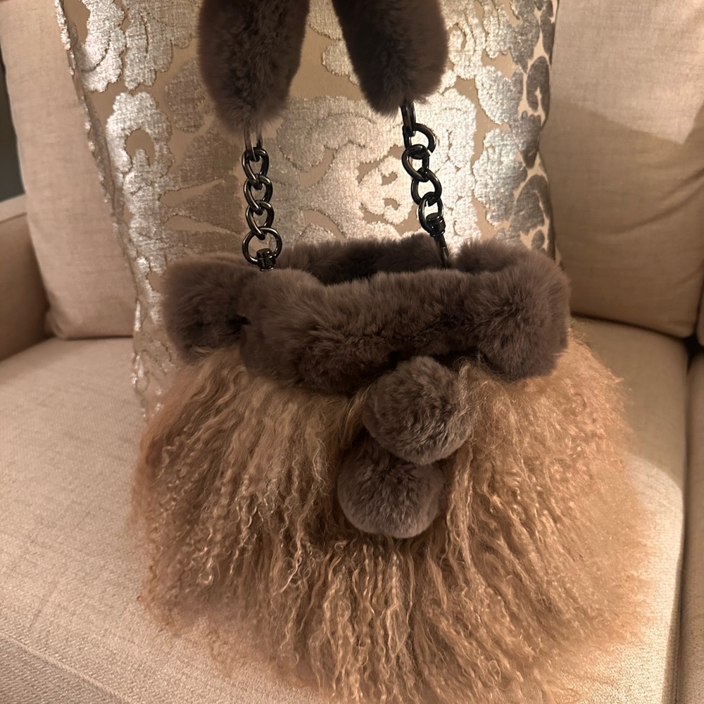 Etcetera Tibetan tan lamb shearling bag.